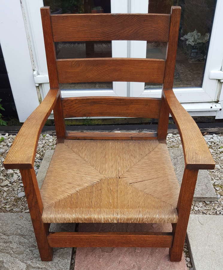 M.H.BAILLIE SCOTT OAK FIRESIDE CHAIR C1900