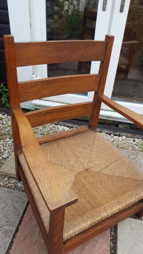 M.H.BAILLIE SCOTT OAK FIRESIDE CHAIR C1900